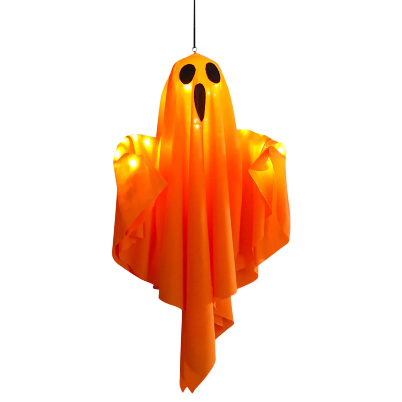Close-up of a glowing orange fabric ghost decoration on a white background