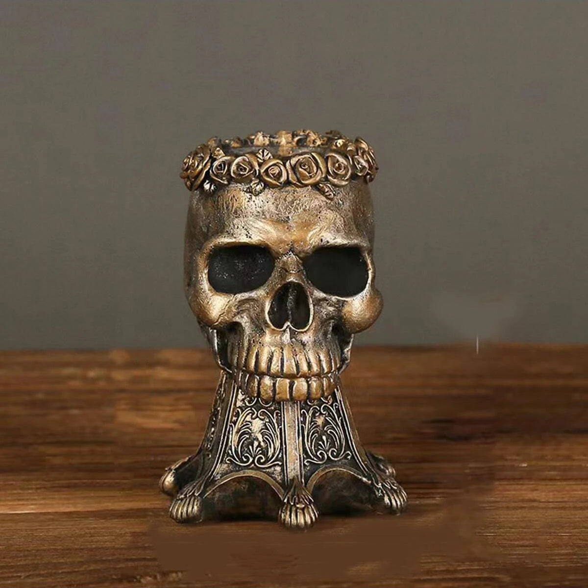 Bronze gothic skull vase with rose crown, close-up front view
