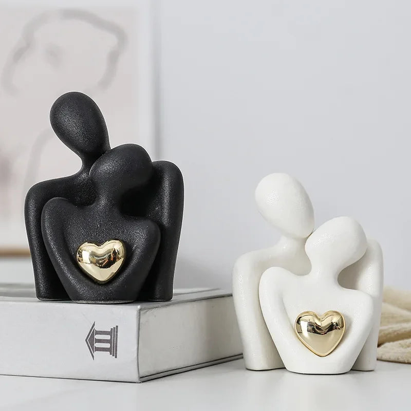 White and black Modern Couple Embrace ceramic figurines side by side