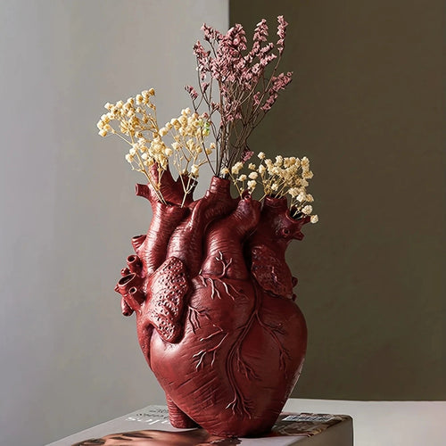 Red Anatomical Heart Sculptural Resin Vase with dried flower arrangement
