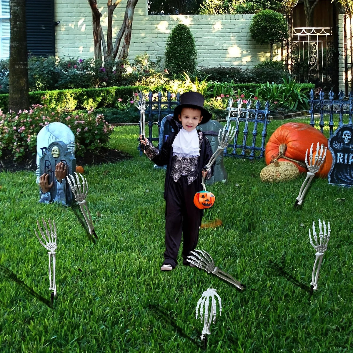 Skeleton hand and skull ground stakes for Halloween yard decor