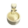 Cat tealight candle holder viewed from the front showing the sitting cat figure