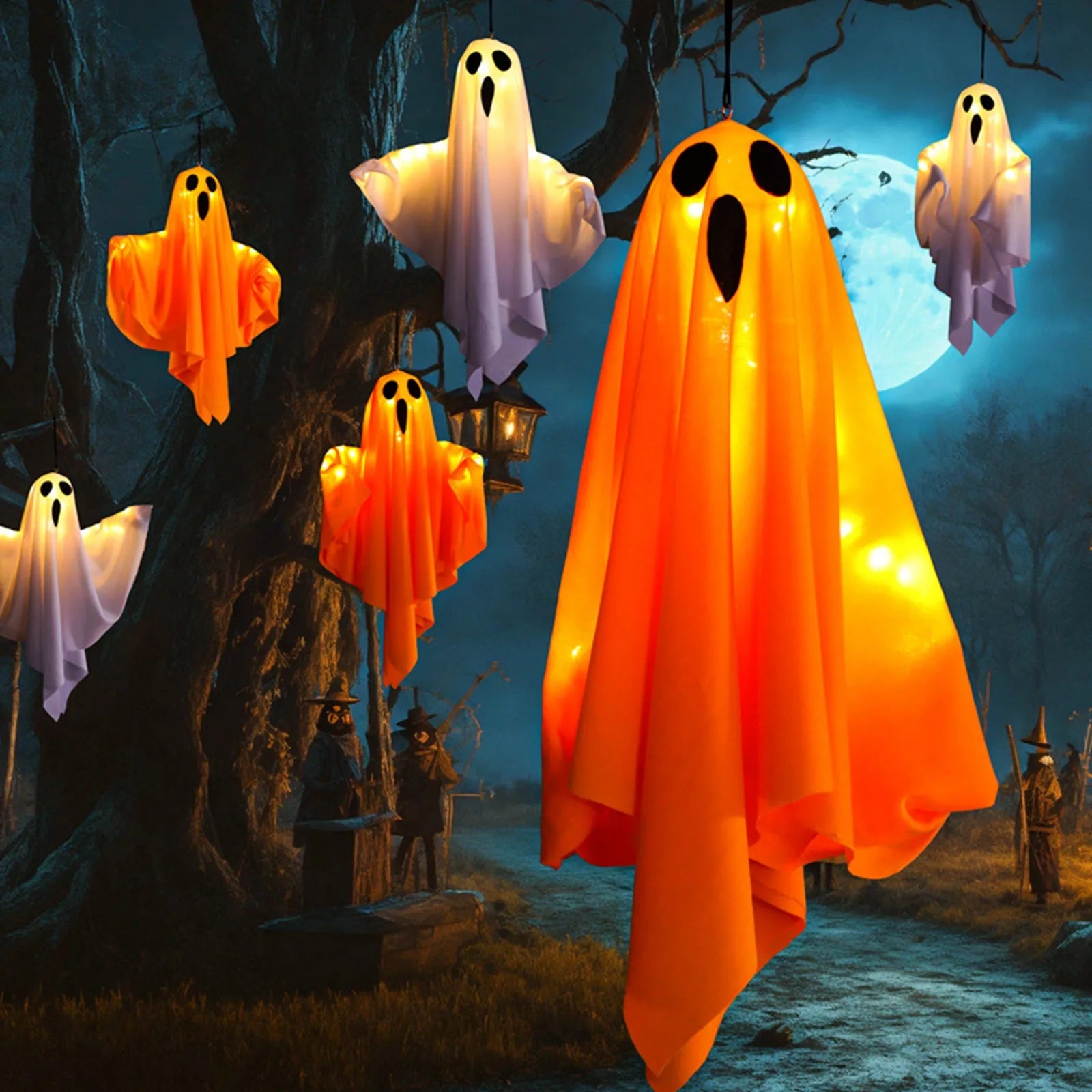 Glowing white fabric ghost hanging indoors near candles, pumpkins and bat decorations