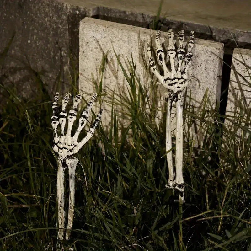 Skeleton hand and skull ground stakes for Halloween yard decor