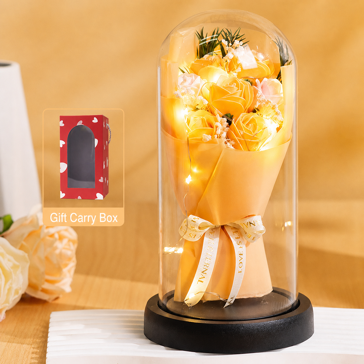 Orange Eternal Rose Glass Dome with warm LED lights, ribbon reading Love is Eternal